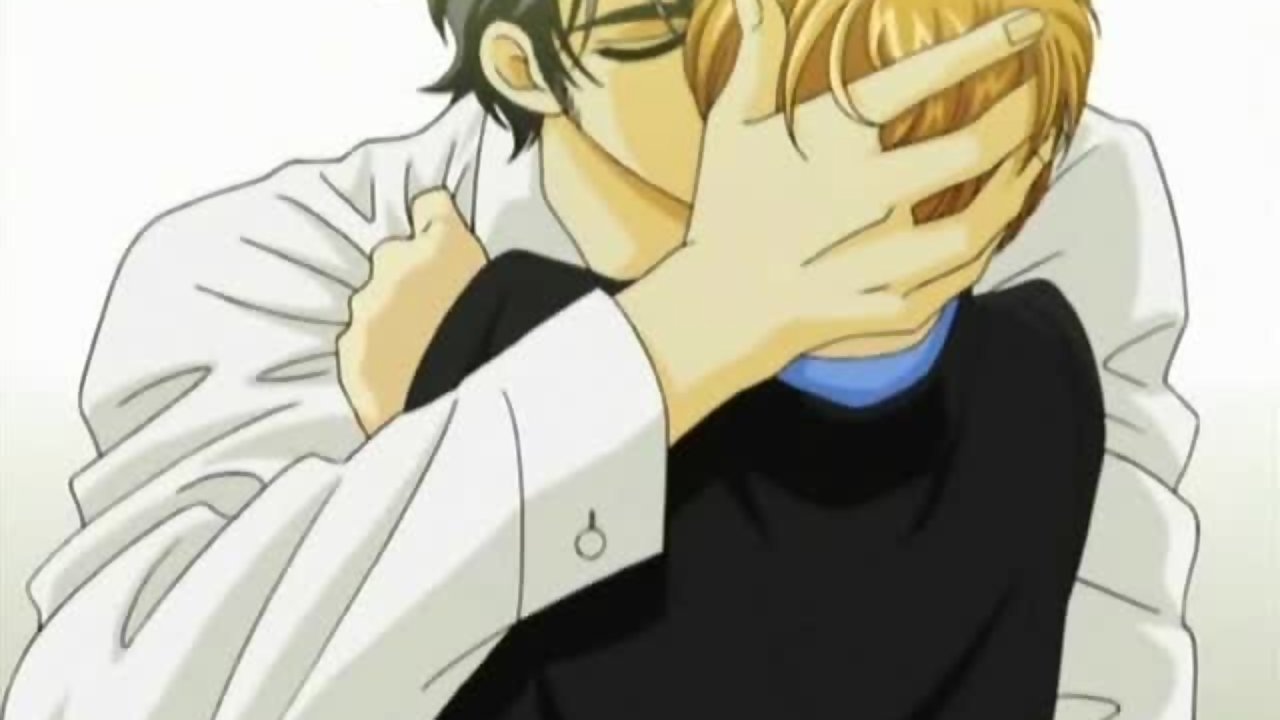 Two gay guys having fun kissing and analizing each other